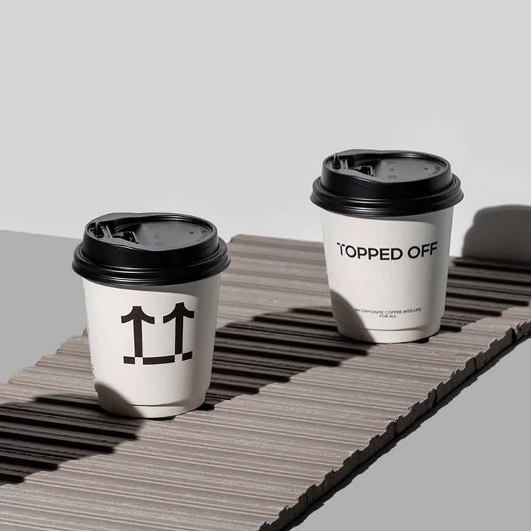 https://themerchlist.com/wp-content/uploads/2023/05/1.-Main-Double-Wall-Coffee-Cup-with-Lid.jpg